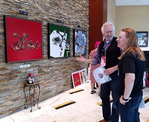 Kevin and Ken Hershenson with his "Do I Know Jack?" paintings at Art Prize 2017