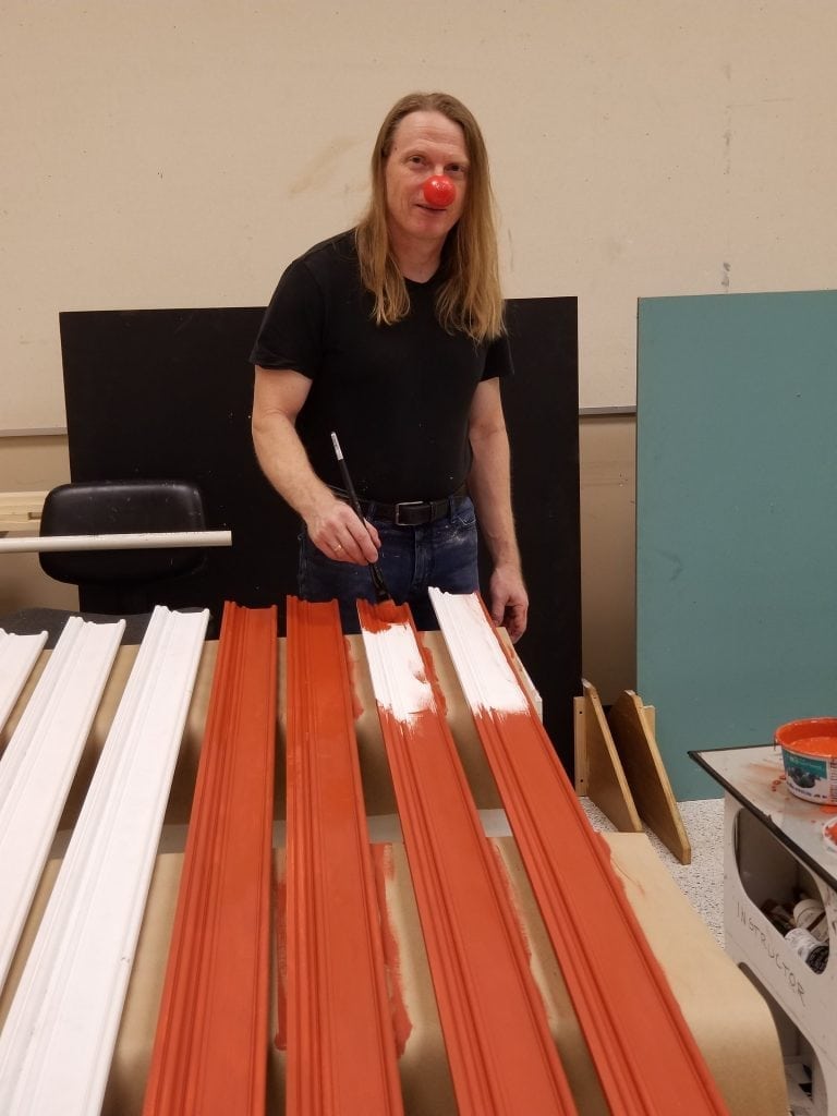 Florida artist Kevin Grass wears a red clown nose on Red Nose Day 2018.