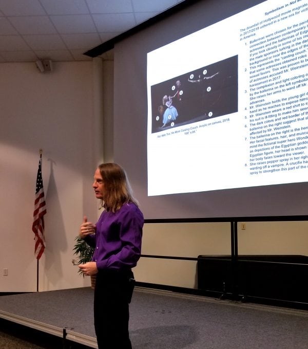 Kevin Grass explains the symbolism in his "Not #MeToo" painting during an artist talk at the Leepa-Rattner Museum of Art in Tarpon Springs, FL