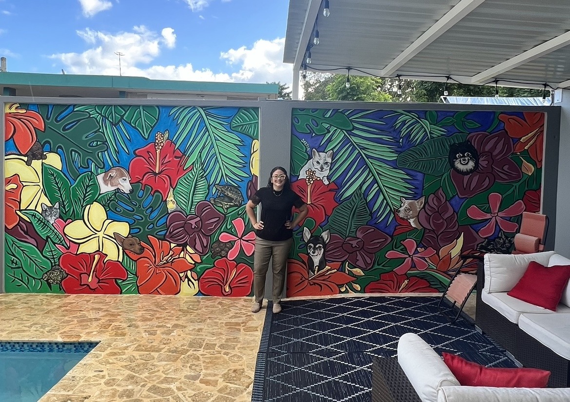 a floral mural with pet portraits