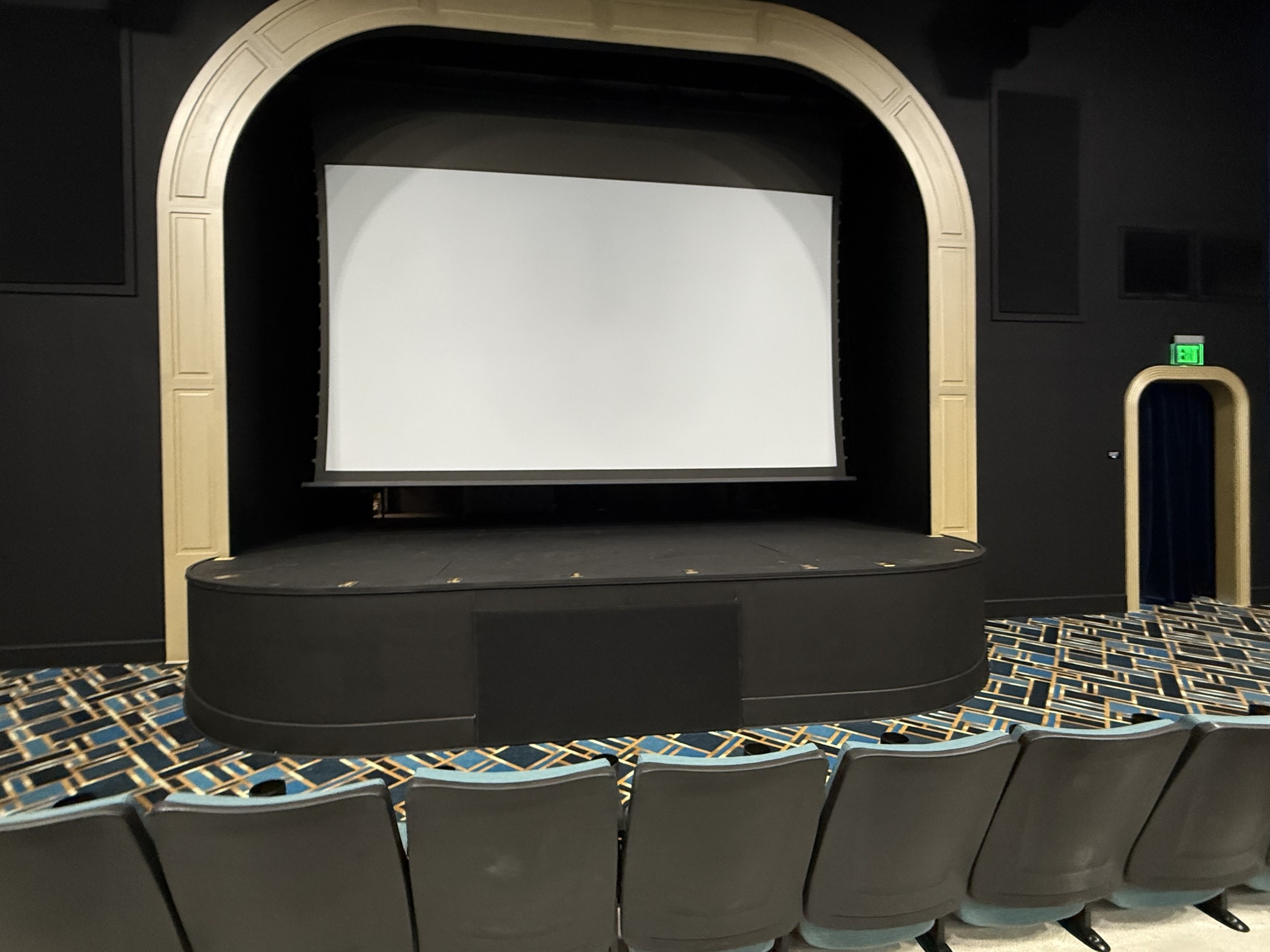 The interior of a theater with Art Deco design.