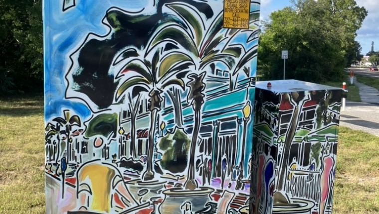 A signal box is decorated with a landscape.