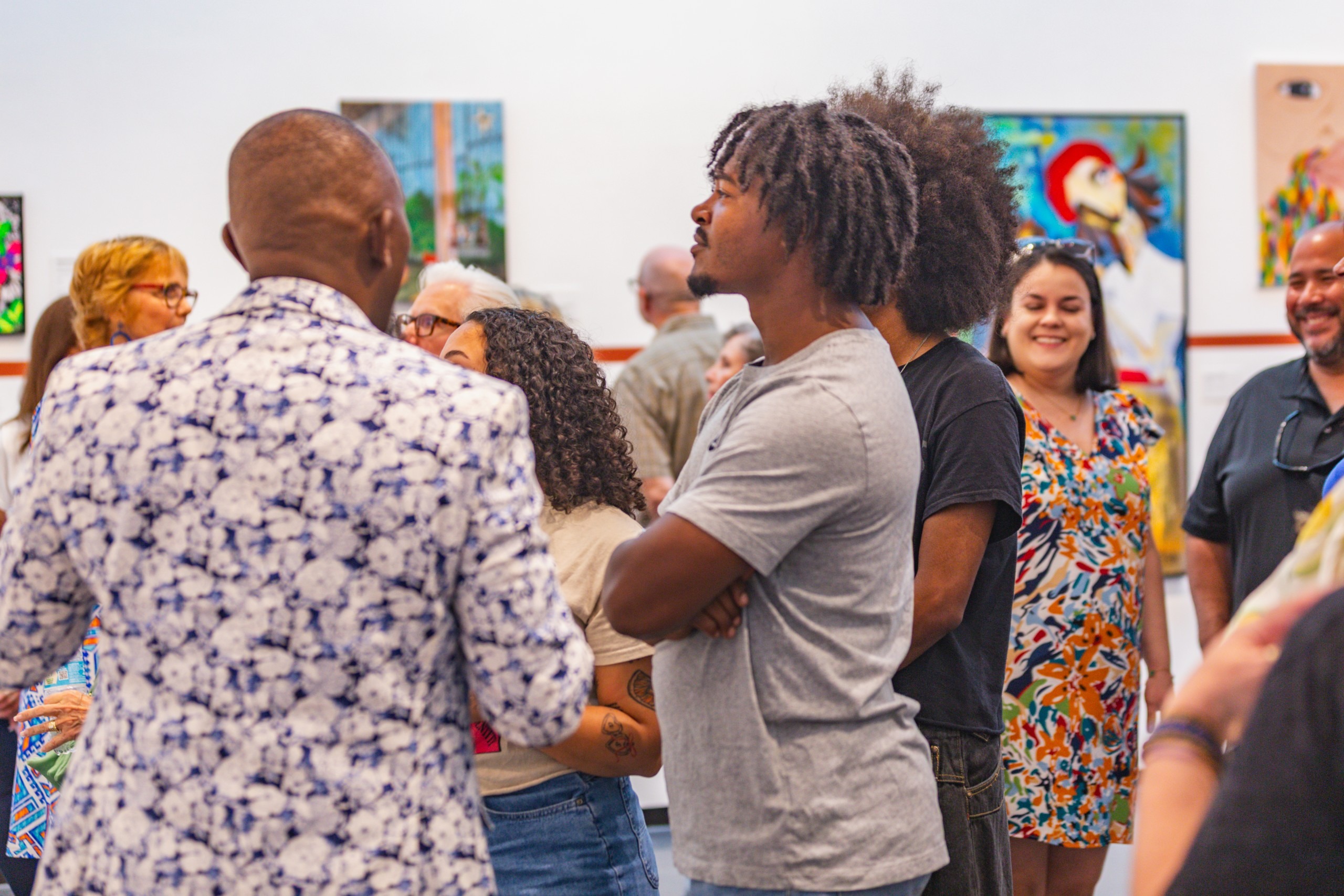 People mingle at a party.