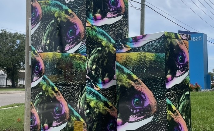 A colorfully-decorated signal box.